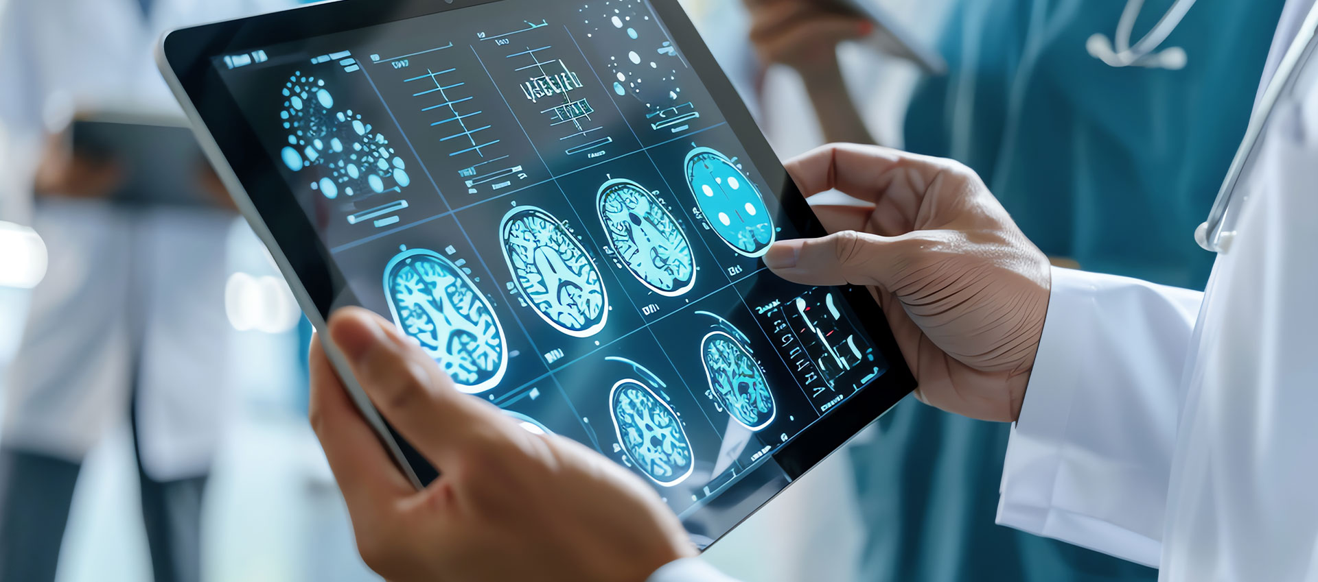 A healthcare professional holding a tablet displaying medical images, in a setting that suggests a modern hospital or clinic.