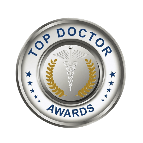 The image shows a digital badge with text that reads  TOP DOCTOR AWARDS  and a laurel wreath icon.